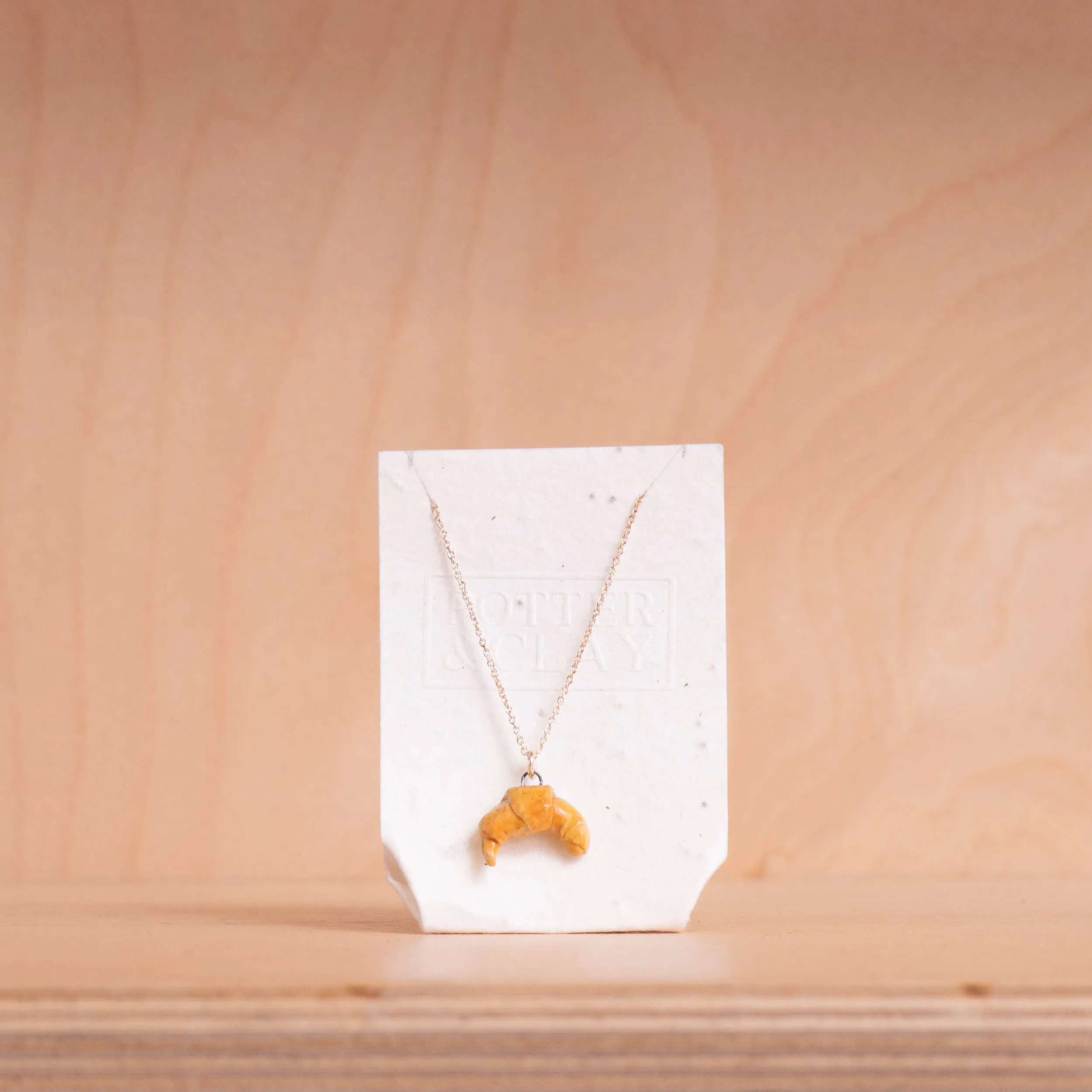 Potter & Clay - Mini Croissant Pendant