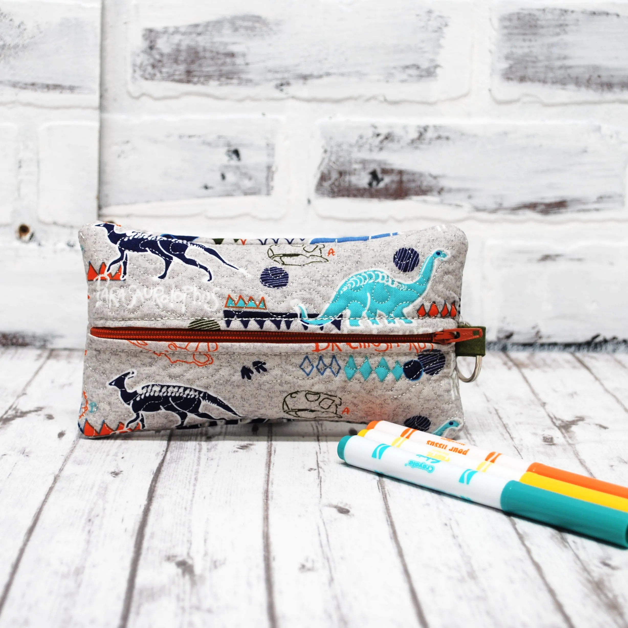 Teal and Orange Dino Personalized Quilted Pouch